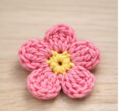 Crochet doily with strawberries in a bowl